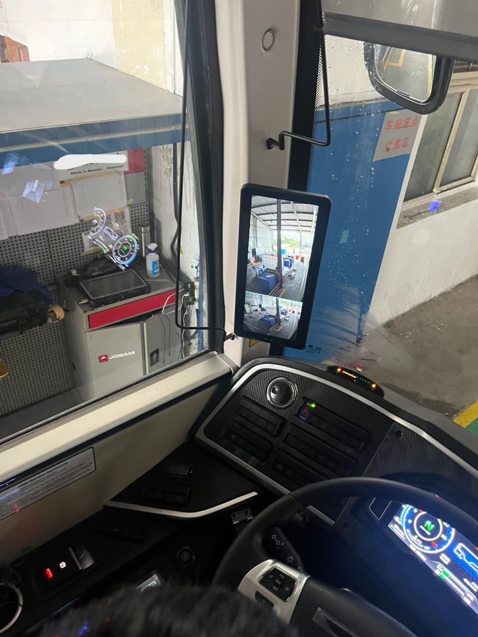 Driver cockpit with digital side-view mirror and instrument cluster