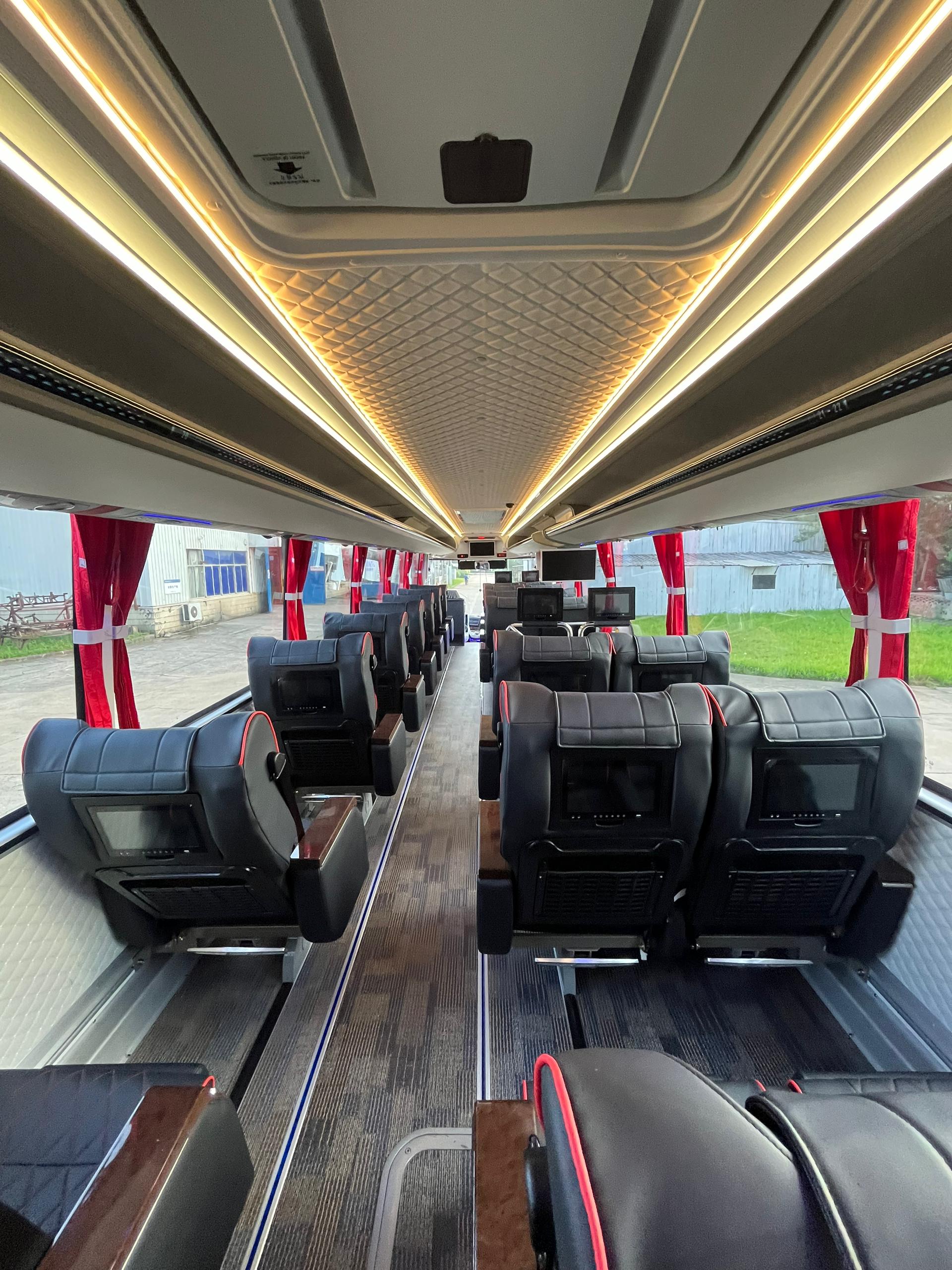 VIP 2+1 black/red interior with seatback screens